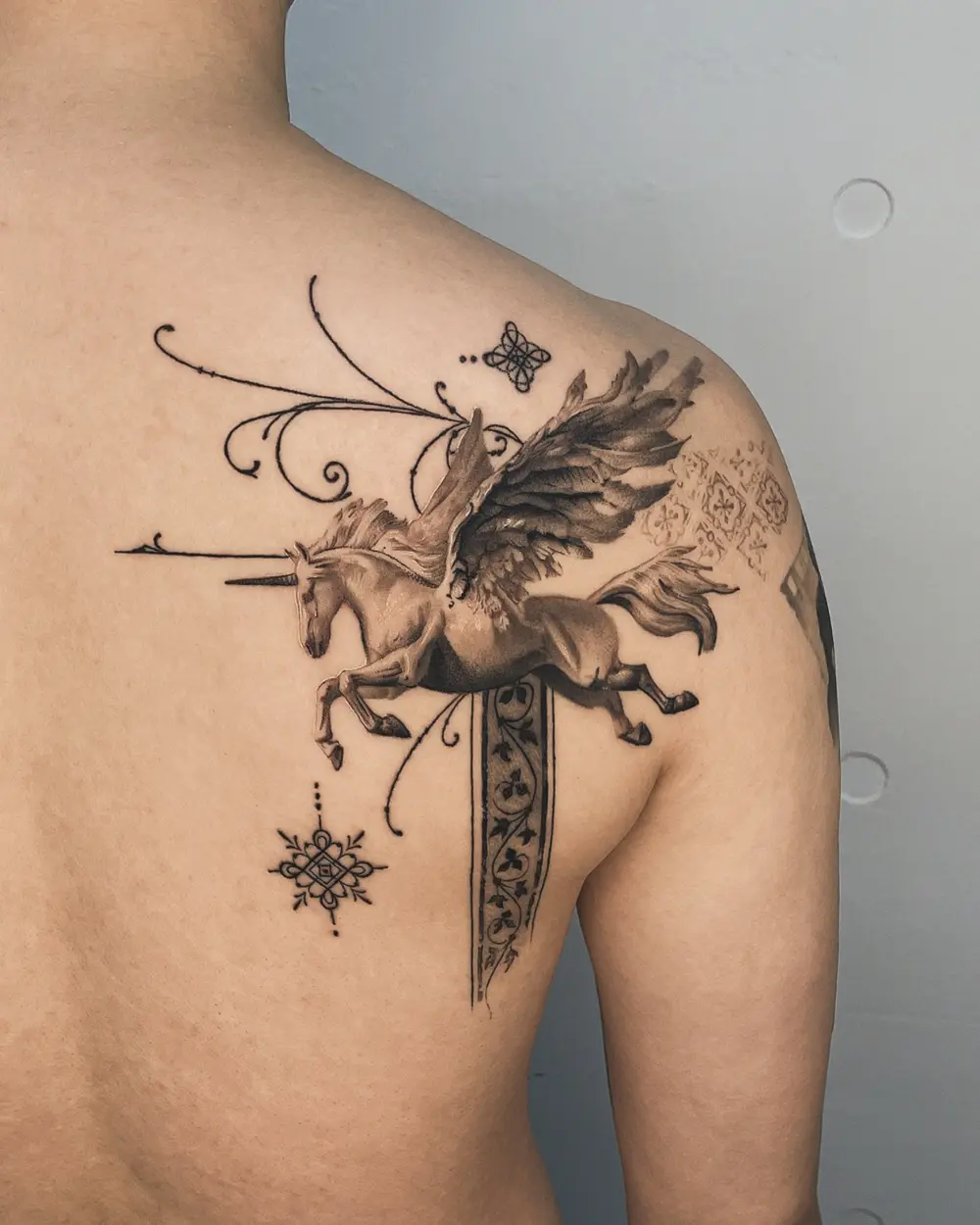 tattooer_amu